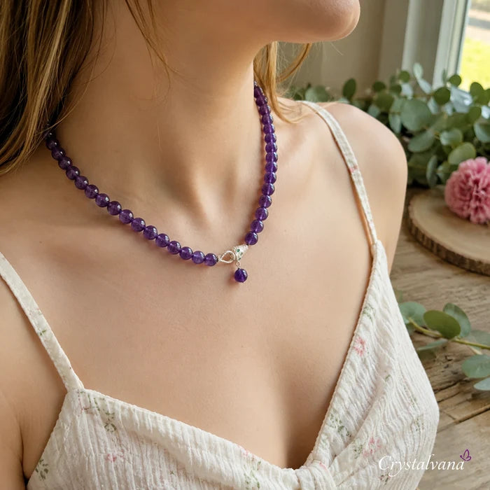 Lifestyle shot of 12mm amethyst necklace worn - crystal healing necklace by Crystalvana