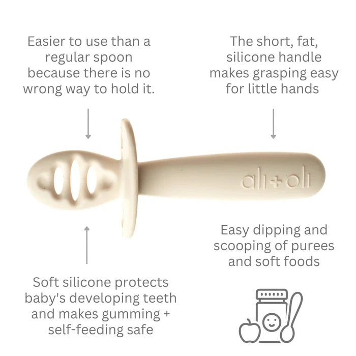 Detailed view of Ali+Oli silicone baby spoon with usage instructions