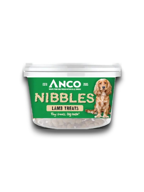Stock image of the Anco Nibbles Beef Treats, showing the packaging pot with a green label and a dog on the front.