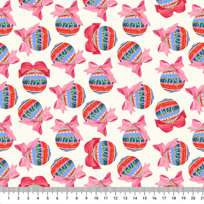 A repeating Christmas pattern on fabric featuring colorful striped ornaments and pink bows on a cream background, with a ruler at the bottom showing scale.