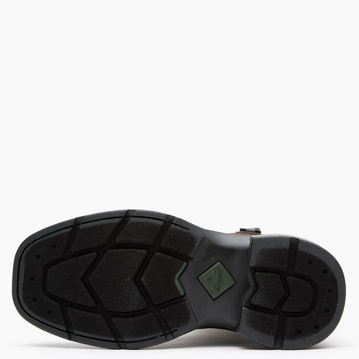 Close-up of a black shoe sole on a white background