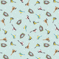 Birds and egg-filled nests on a sky blue 100% cotton fabric