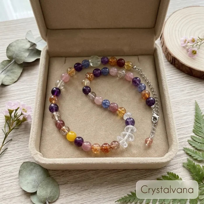 Black Gold Super Seven crystal necklace in gift box showing bead detail with golden rutile inclusions, Crystalvana