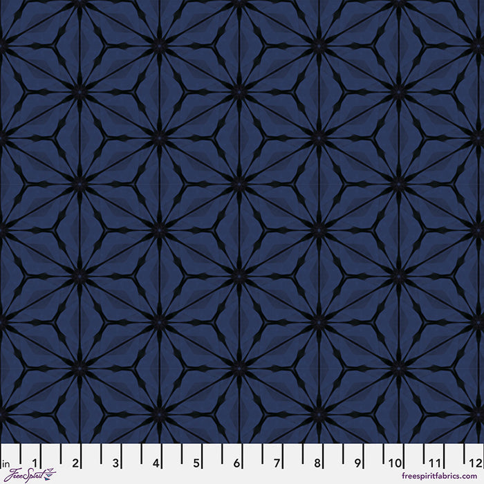 Bloom Noctural hexagonal printed quilting fabric in blues with a cm ruler