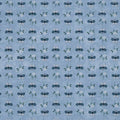 A repeating pattern of small butterflies and floral motifs on a light blue fabric background.