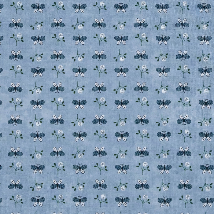 A repeating pattern of small butterflies and floral motifs on a light blue fabric background.