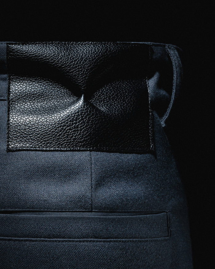 'BUTTONS' PLEATED PANTS