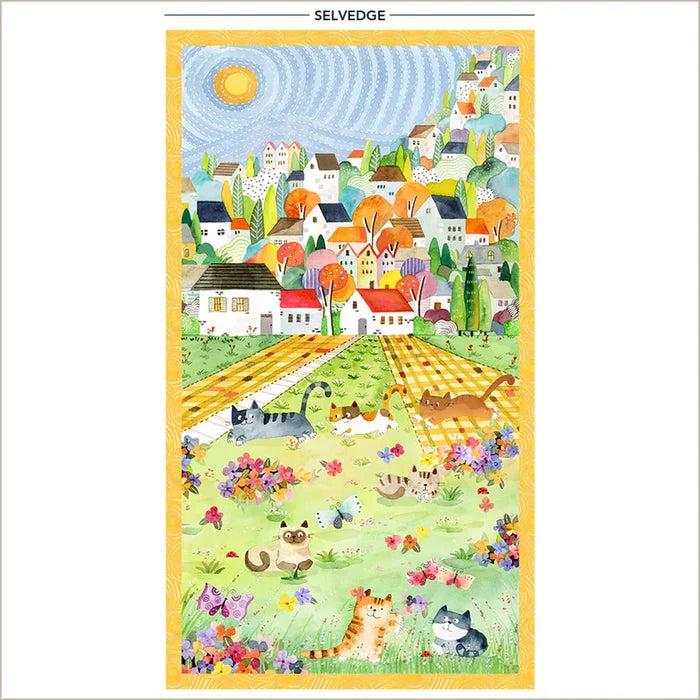 Colorful quilt with a village scene, cats, and flowers on a white background.