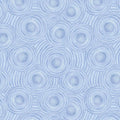 Pattern of concentric circles on a light blue quilting fabric