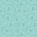 Pattern of concentric circles on a teal quilting fabric