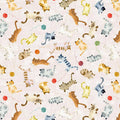 Pattern of cartoon cats and yarn balls on a light quilting fabric