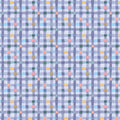 Patterned fabric with small squares in various colors on a blue background