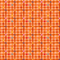 Patterned fabric with orange and multicolor grid design