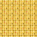 Patterned fabric with a grid of squares in various colors on a yellow background