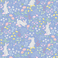 Bunnies printed on a cornflower blue cotton quilting fabric