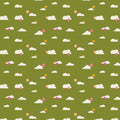 Clouds printed on a green cotton quilting fabric