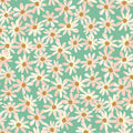 Pattern of pink and white flowers with yellow centers on a green cotton quilting fabric