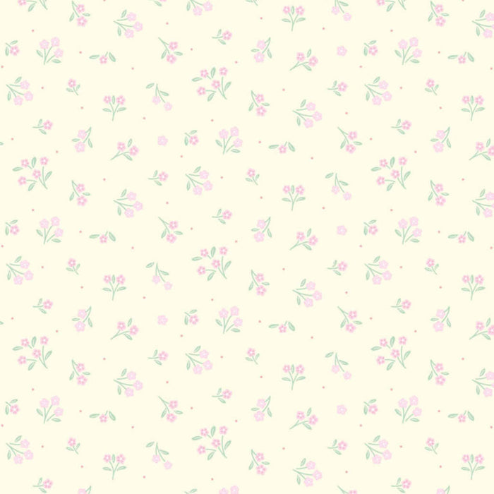 Floral pattern with small pink flowers and green leaves on a light beige cotton quilting fabric