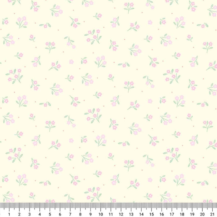 Floral pattern on a light cotton quilting fabric with a ruler at the bottom.