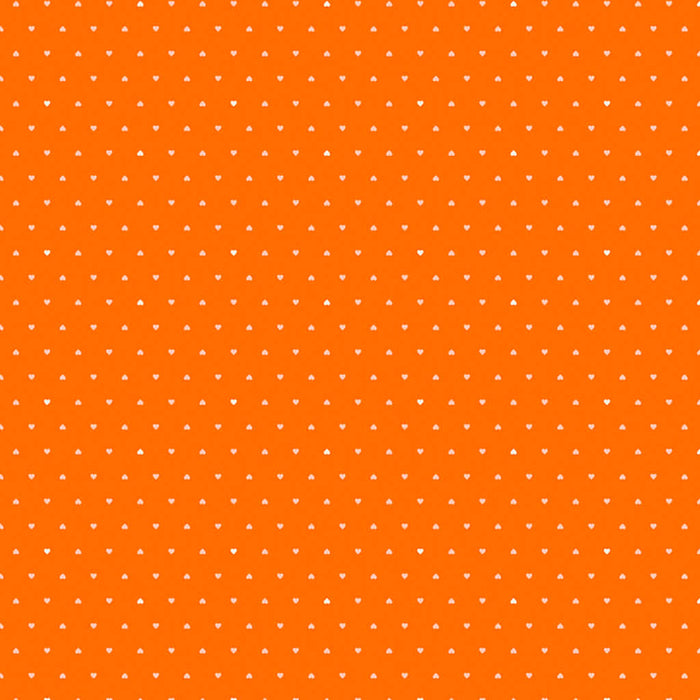 Ditsy hearts on orange cotton fabric