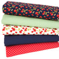 Ditsy strawberry fat quarter bundle with a mint mini check and spots on red cotton poplin