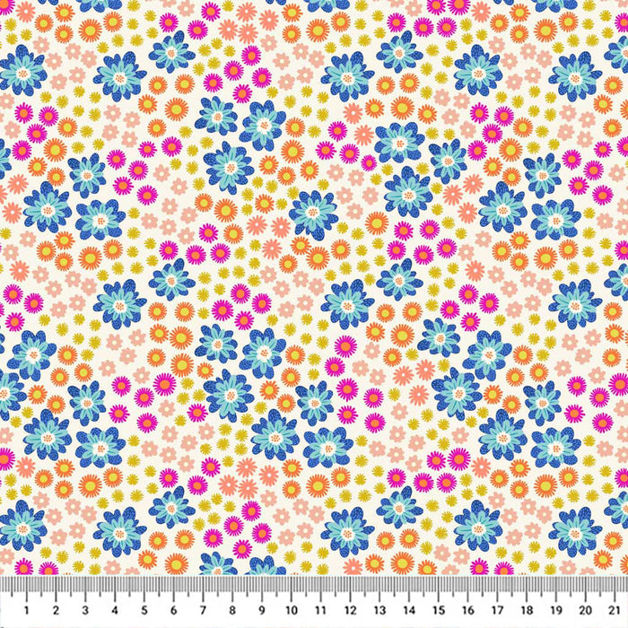 Blue flowers printed on a cream quilting cotton fabric with a cm ruler