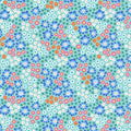 Blue flowers printed on a turquoise quilting cotton fabric