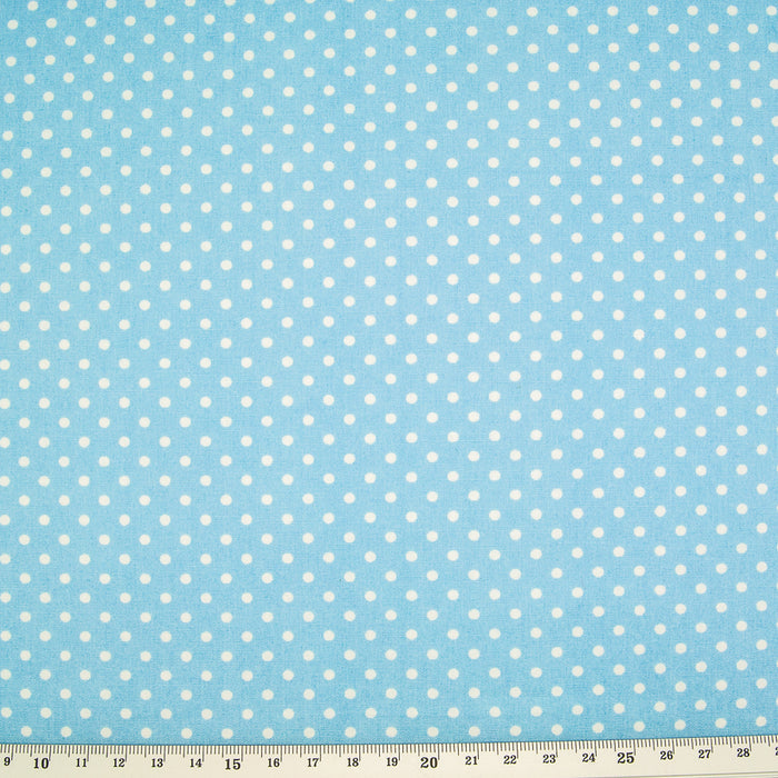 White spots on a pale blue cotton poplin by Rose & Hubble