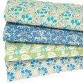 A fat quarter bundle of 4 art prints on a cotton percale fabric