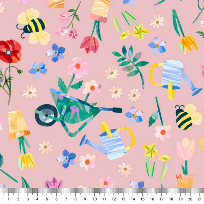 Colourful garden-themed fabric with flowers, bees, and watering cans on a pink cotton quilting fabric.