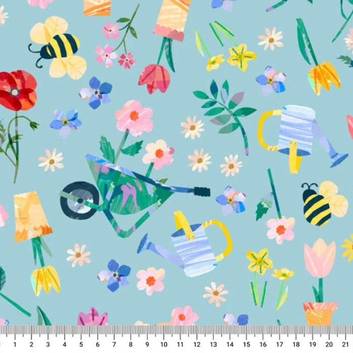 Colourful garden-themed fabric pattern with flowers, bees, and watering cans on a blue cotton quilting fabric.