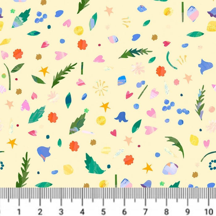 Colourful floral pattern on a yellow cotton quilting fabric with a ruler at the bottom.