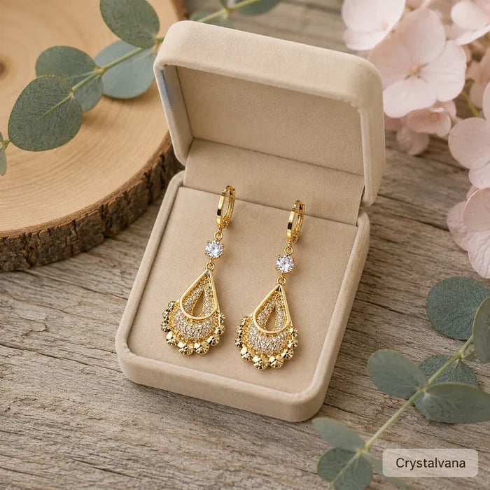 Model wearing French design hollow water drop earrings blonde side profile ear close-up, Crystalvana