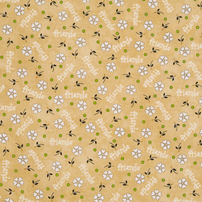 A repeating pattern of small white daisy-like flowers with dark stems on a warm tan cotton quilting fabric, interspersed with green dots and repeated diagonal text reading 'friends'.
