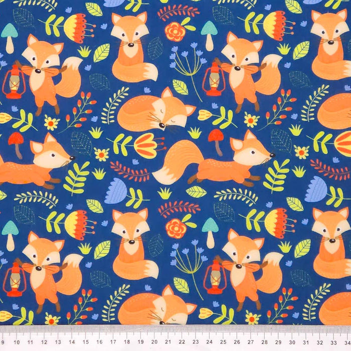 Pattern of foxes and nature elements on a blue background with a ruler at the bottom.