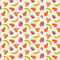 Fruit printed on a cream cotton quilting fabric