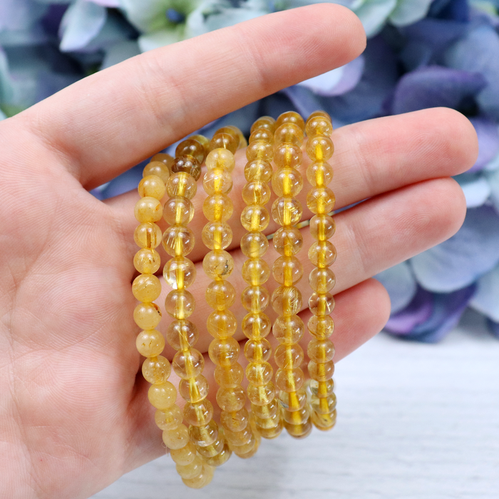 Natural Gold Rutilated Quartz bead detail – each stone is one of a kind