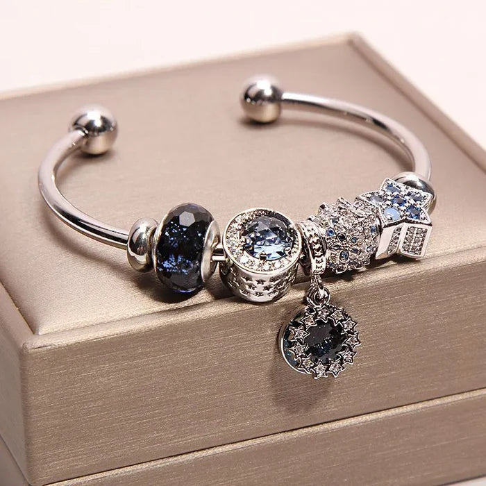 Handcrafted blue crystal wish bracelet with moon and star charms - detail two