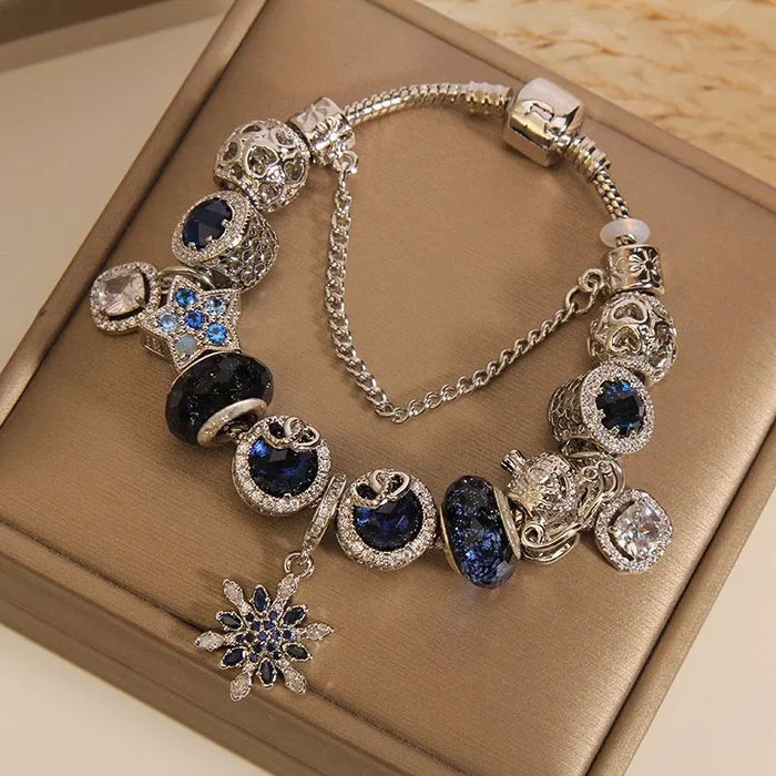 Blue starry sky bracelet with snowflake charm - handcrafted natural crystals