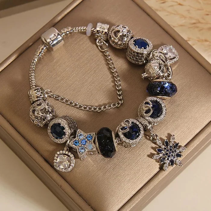 Blue beaded wish bracelet with snowflake charm - detail three