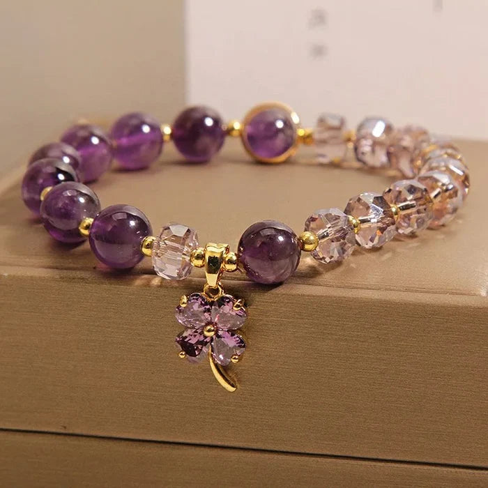 Four-leaf clover charm close-up - luck and calm bracelet