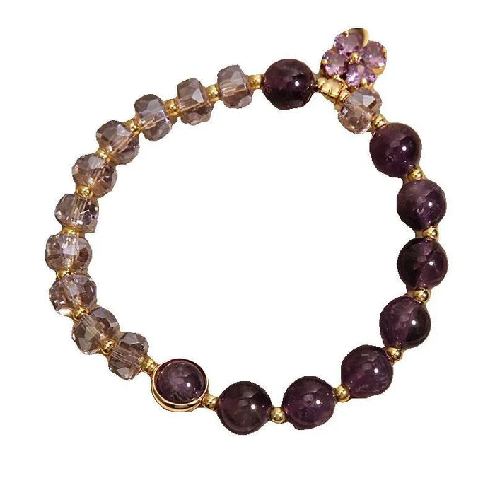 Amethyst clover bracelet on wrist - intuition and luck jewelry