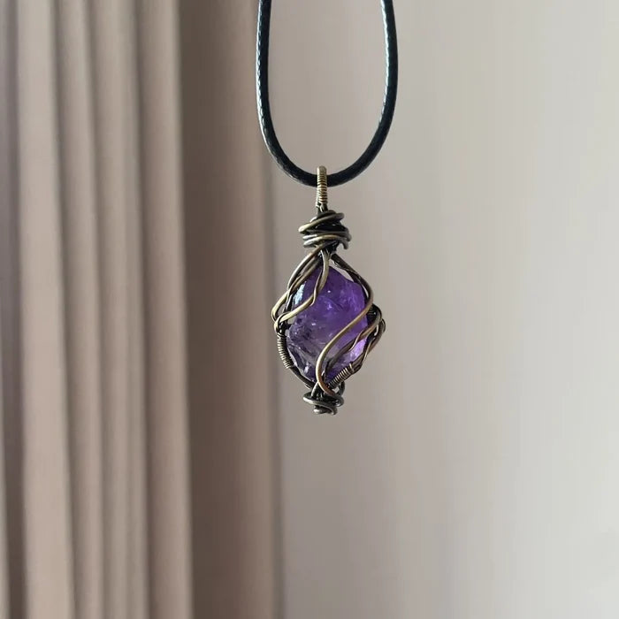 Amethyst necklace on display with natural lighting — handcrafted crystal necklace for positive energy by Crystalvana