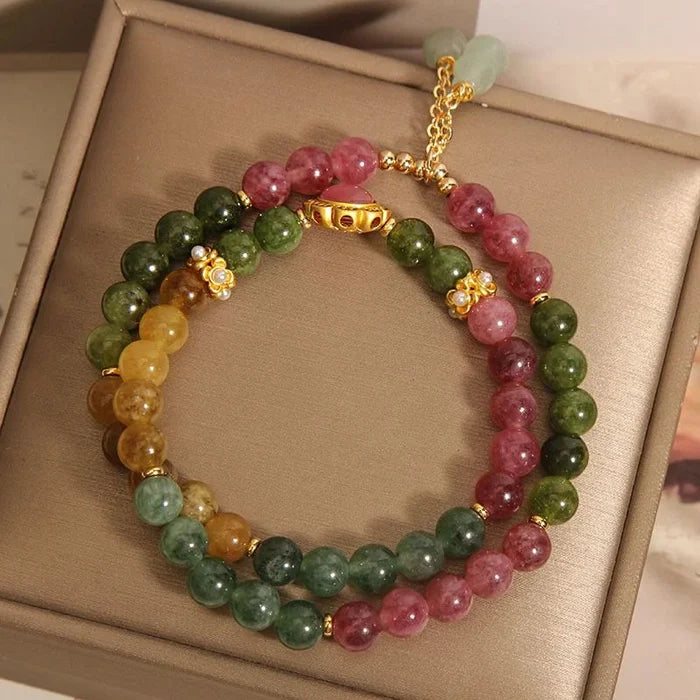 Handcrafted tourmaline bracelet with hulu charm - detail four