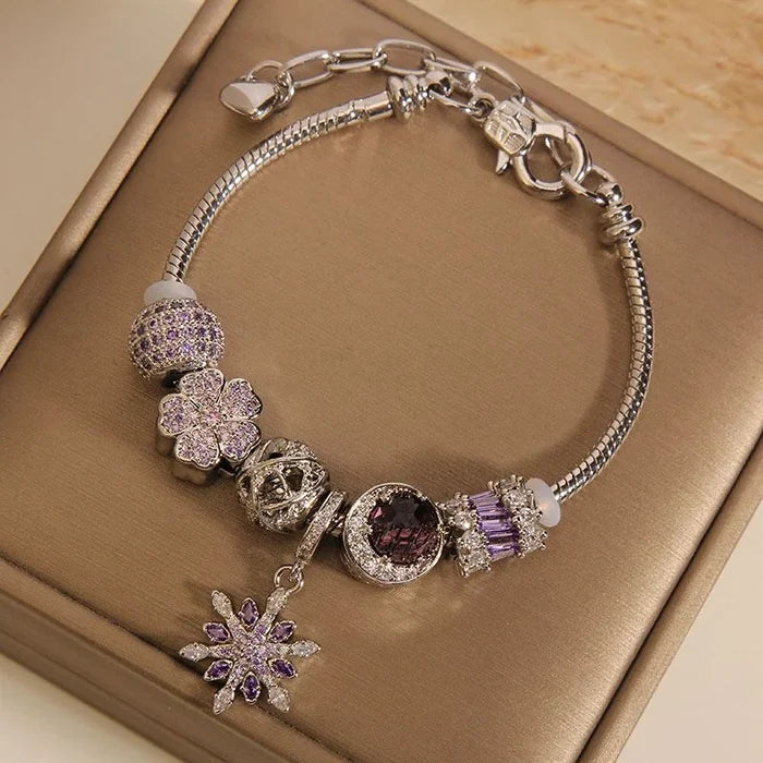 Amethyst snowflake star bracelet on wrist - intuition and hope jewelry