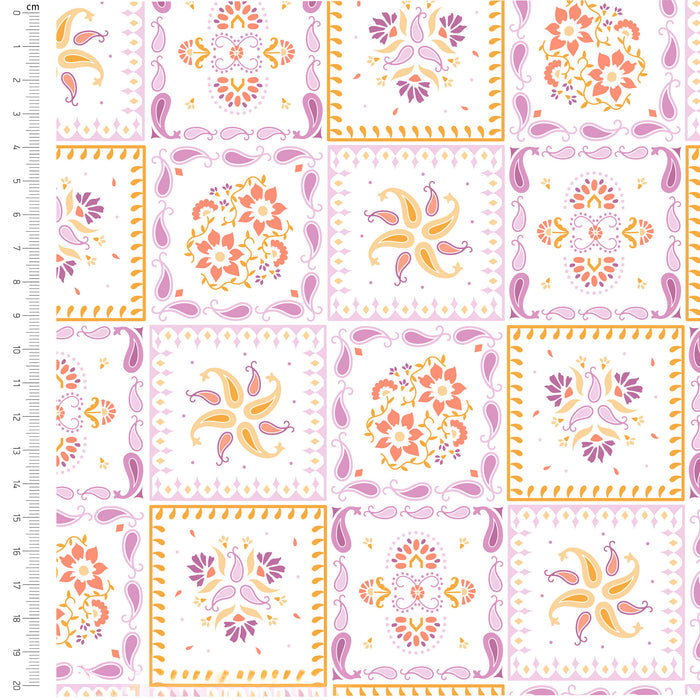Patchwork pattern with floral and paisley designs on a white background, measured with a ruler.