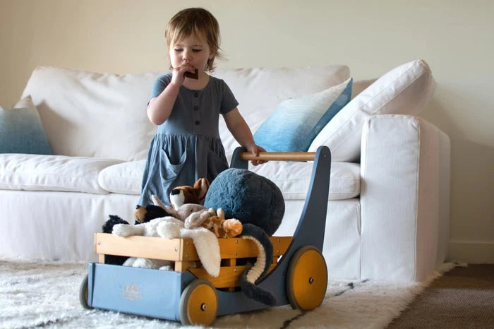 Child with a Kinderfeets Cargo Walker in Slate Blue