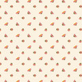 Ladybirds printed on a cream cotton quilting fabric