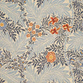 Floral patterned fabric with blue, orange, and beige colors on a textured background