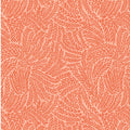 A textured leaf design on orange quilting fabric